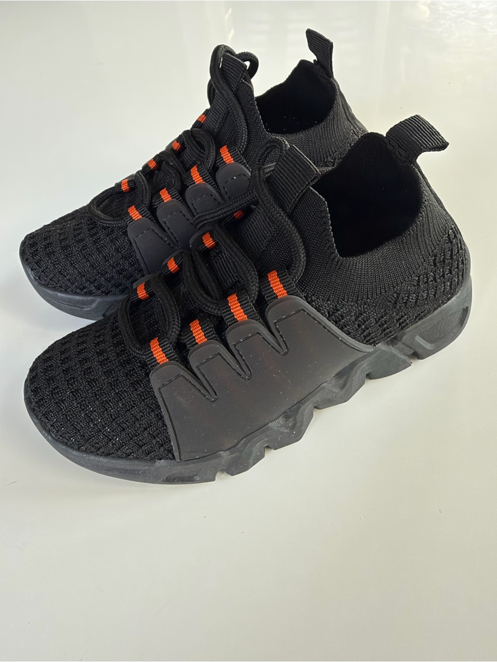 Never worn Kids Black Slip-On Athletic Sneakers with Orange Accents